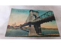 П К Cincinnati Suspension Bridge over Ohio River and Skyline