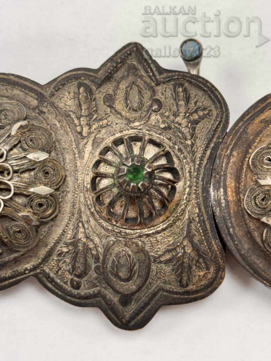 Auction Revival-era silver filigree buckles, forged, colored glass Auction Revival-era silver filigree buckles, forged, colored glass