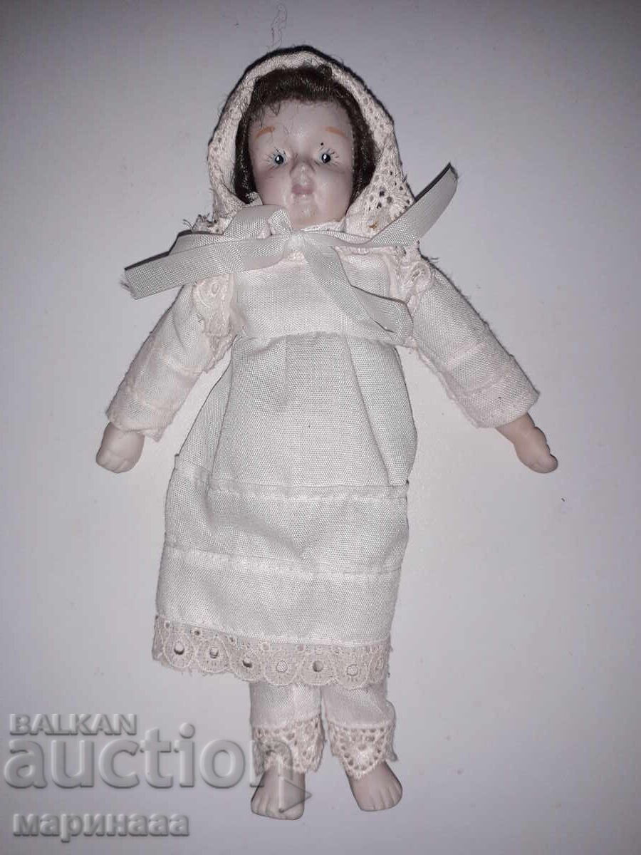 OLD SMALL DOLL. PORCELAIN