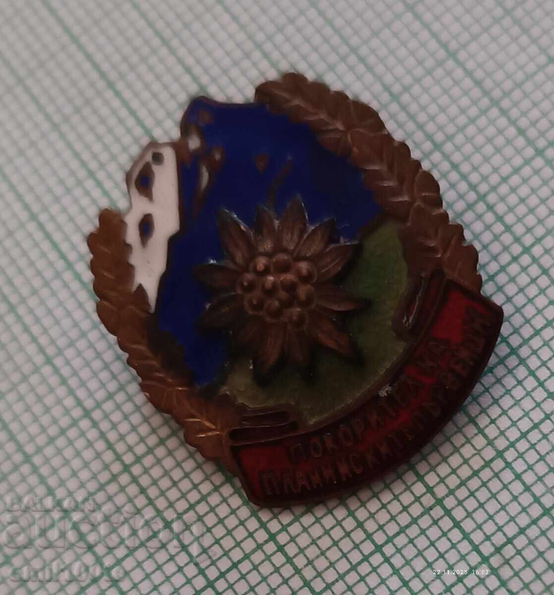 Delivery of Badge - Conqueror of Mountain Peaks