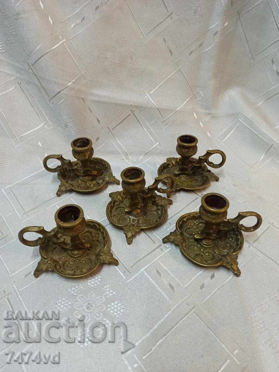Delivery of Set of 5 bronze candlesticks with ornaments and handles