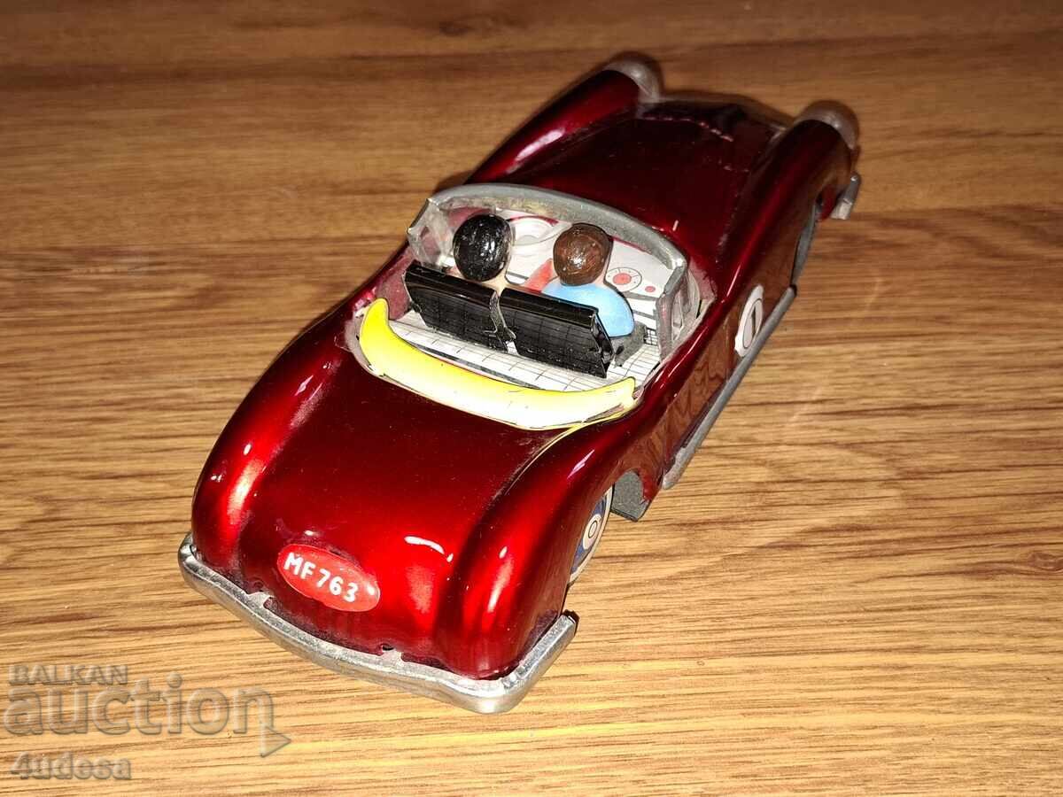 Delivery of Made in China old tin car with an inertial mechanism