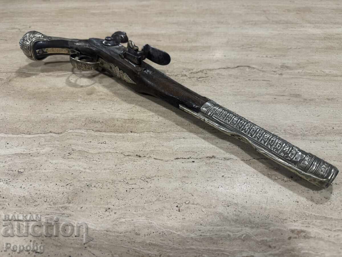 Auction  Old flint pishtov