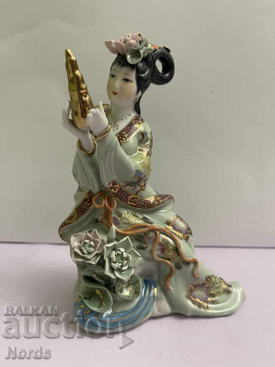 Porcelain figurine with markings