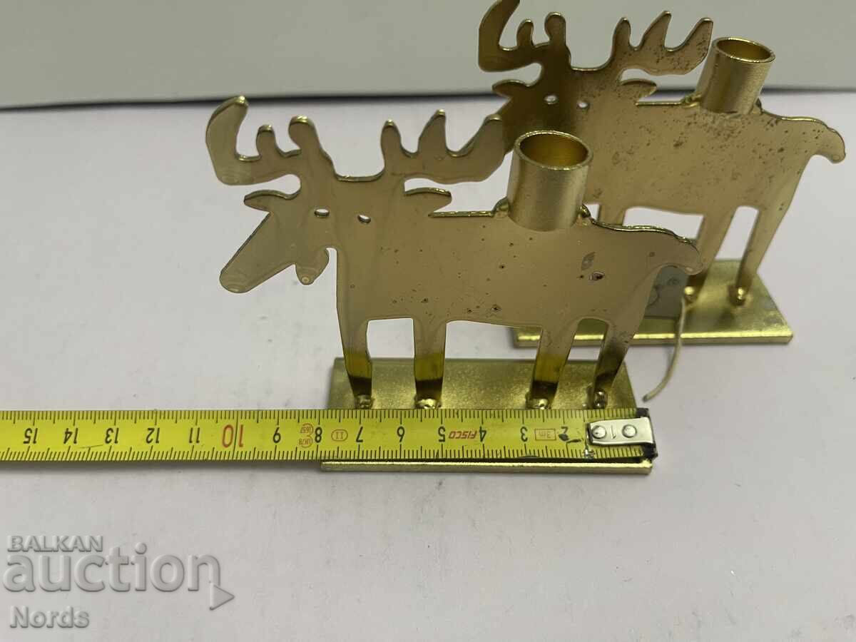 Livrarea Sfeșnice de Crăciun metalice Livrarea Sfeșnice de Crăciun metalice