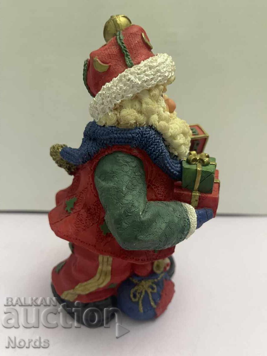 Figurină de Crăciun Moș Crăciun cu preț 6.20 BGN | € 3.17 Figurină de Crăciun Moș Crăciun cu preț 6.20 BGN | € 3.17