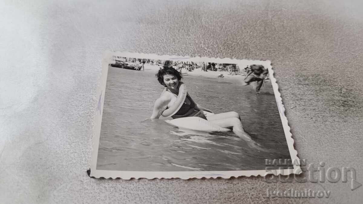 Photo Varna Young girl with a belt in the sea 1962