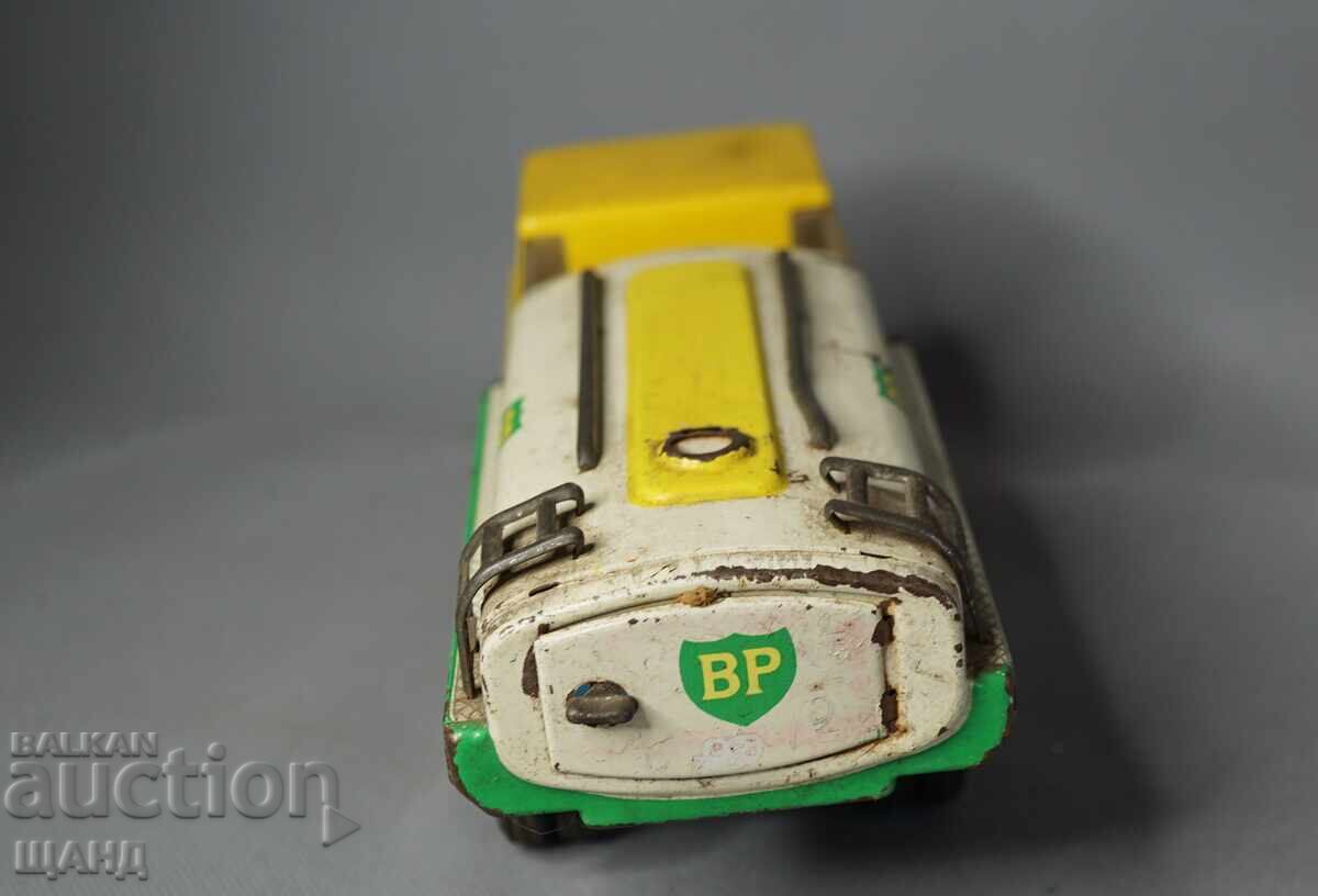 Delivery of Old German metal toy tank truck model