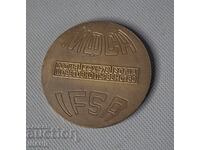 Plachetă veche de bronz Federația Internațională de Gimnastică Acrobatică