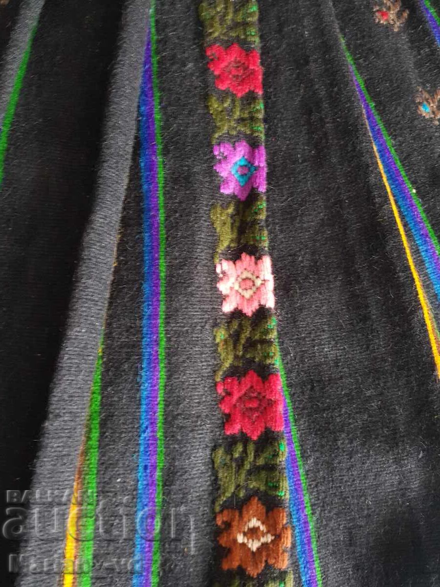 Delivery of Old woolen shawl, a part of a traditional costume Delivery of Old woolen shawl, a part of a traditional costume