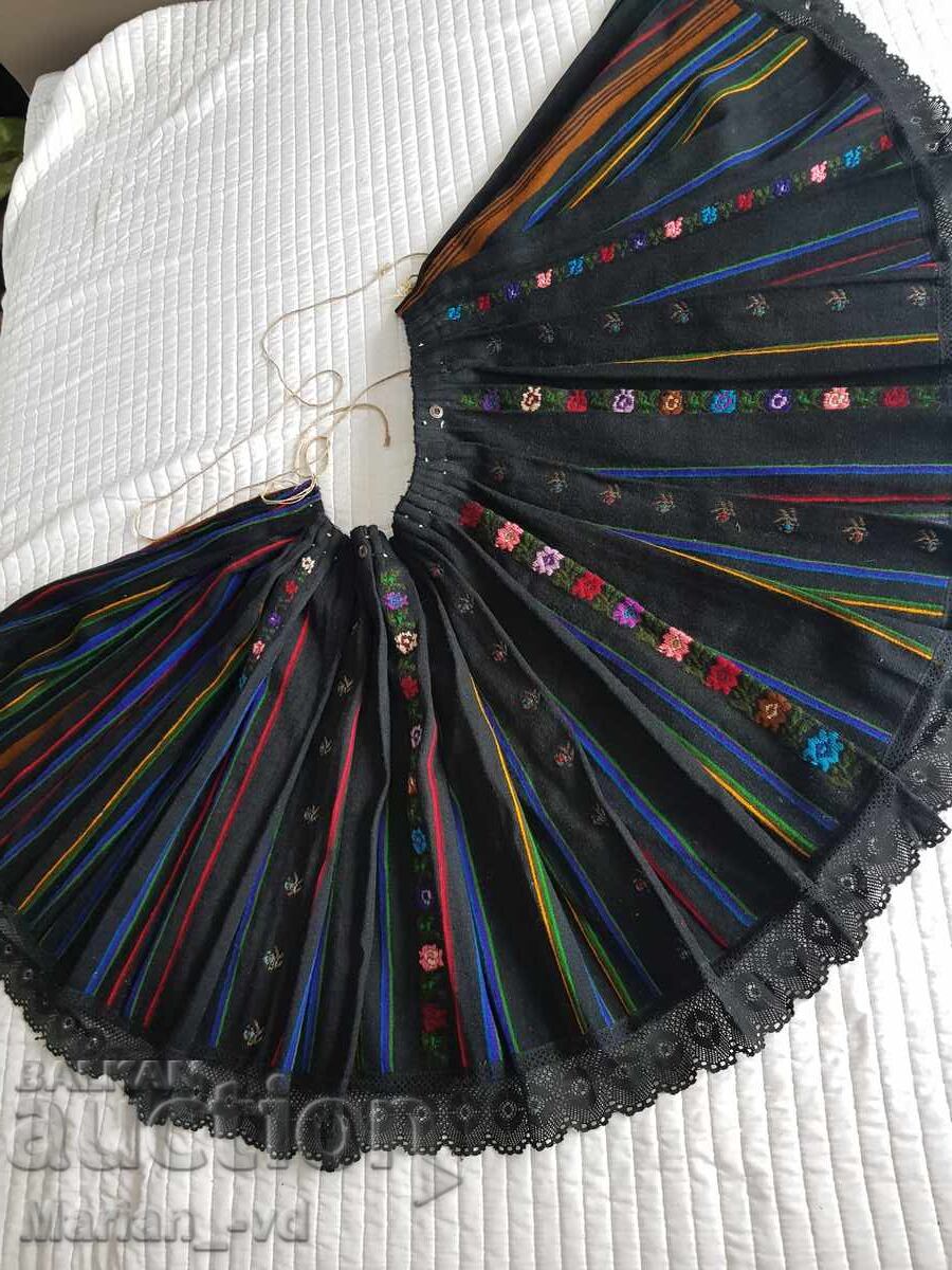 Old woolen shawl, a part of a traditional costume Old woolen shawl, a part of a traditional costume