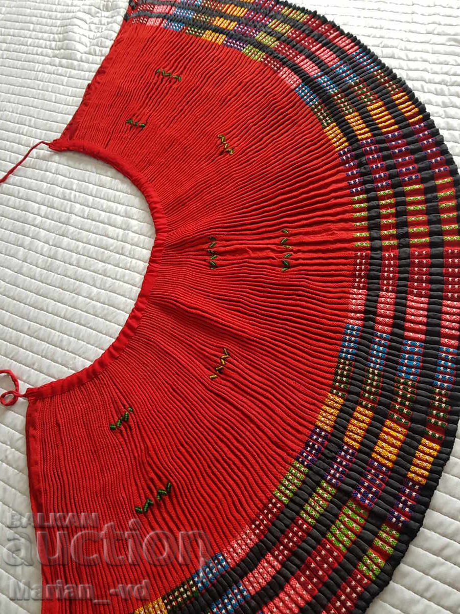 Delivery of Old woolen shawl, a part of a traditional costume