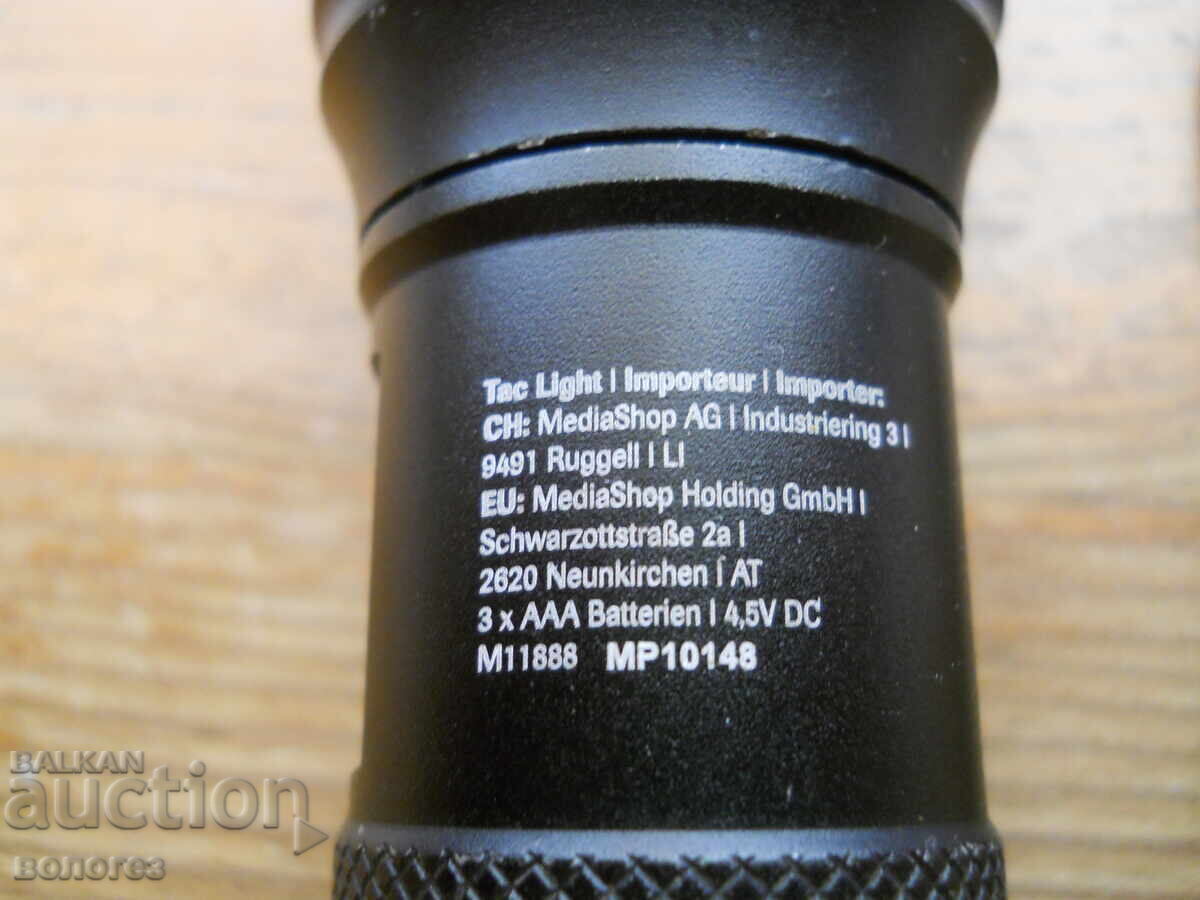 Auction  Powerful LED Flashlight "Tac Light"