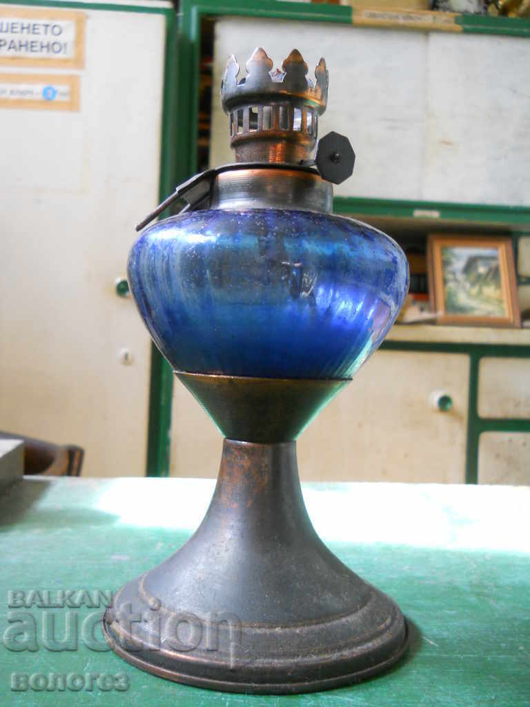 Old gas lamp made of brass and glass