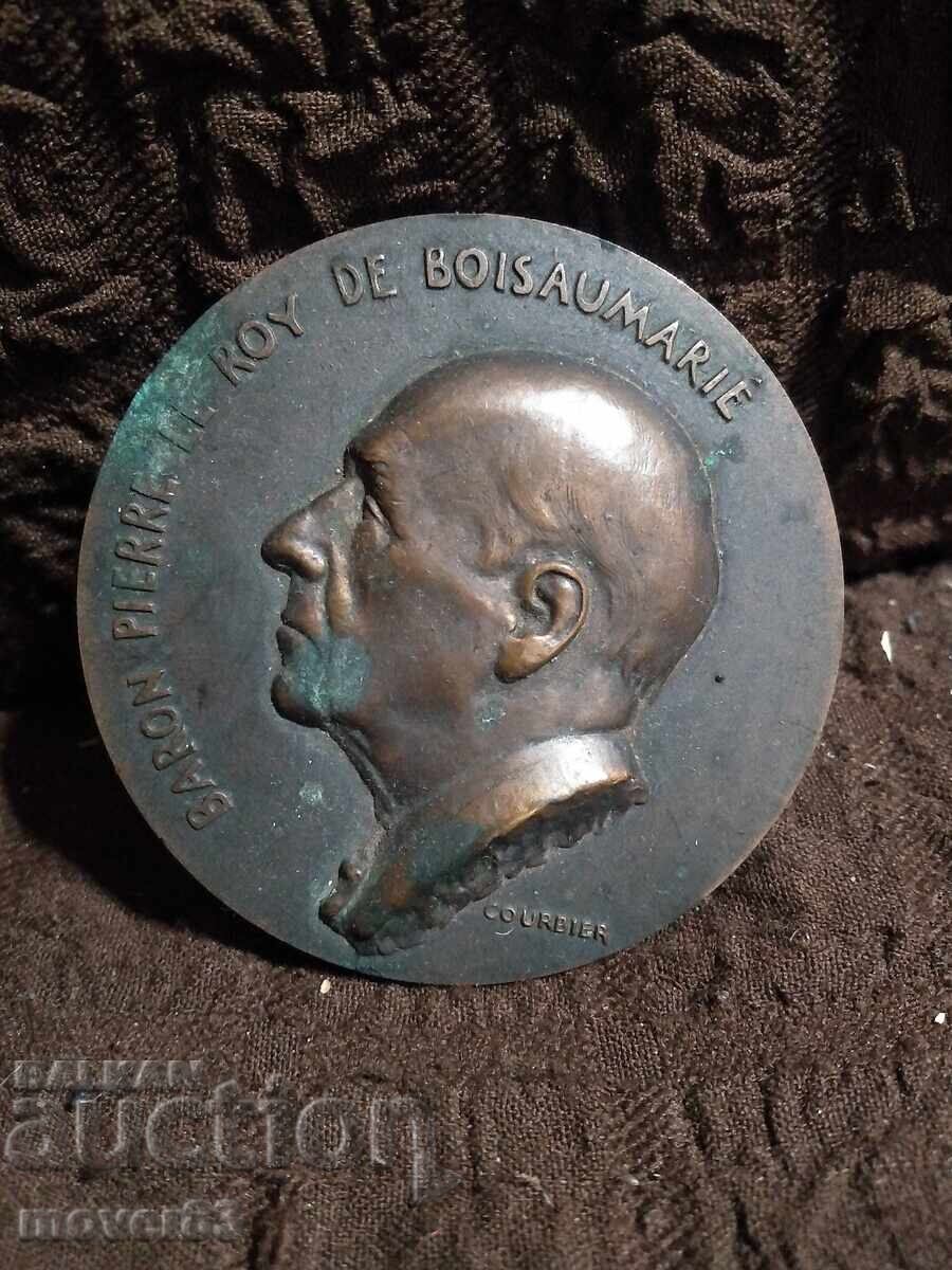 Old bronze plaque. Winemaking. France Old bronze plaque. Winemaking. France