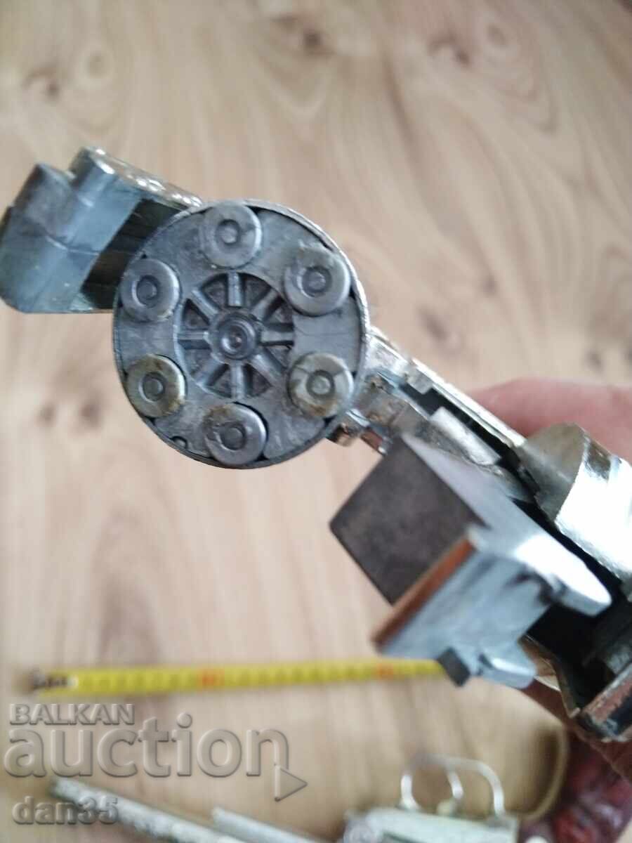 Auction  TWO OLD CAPPED REVOLVERS