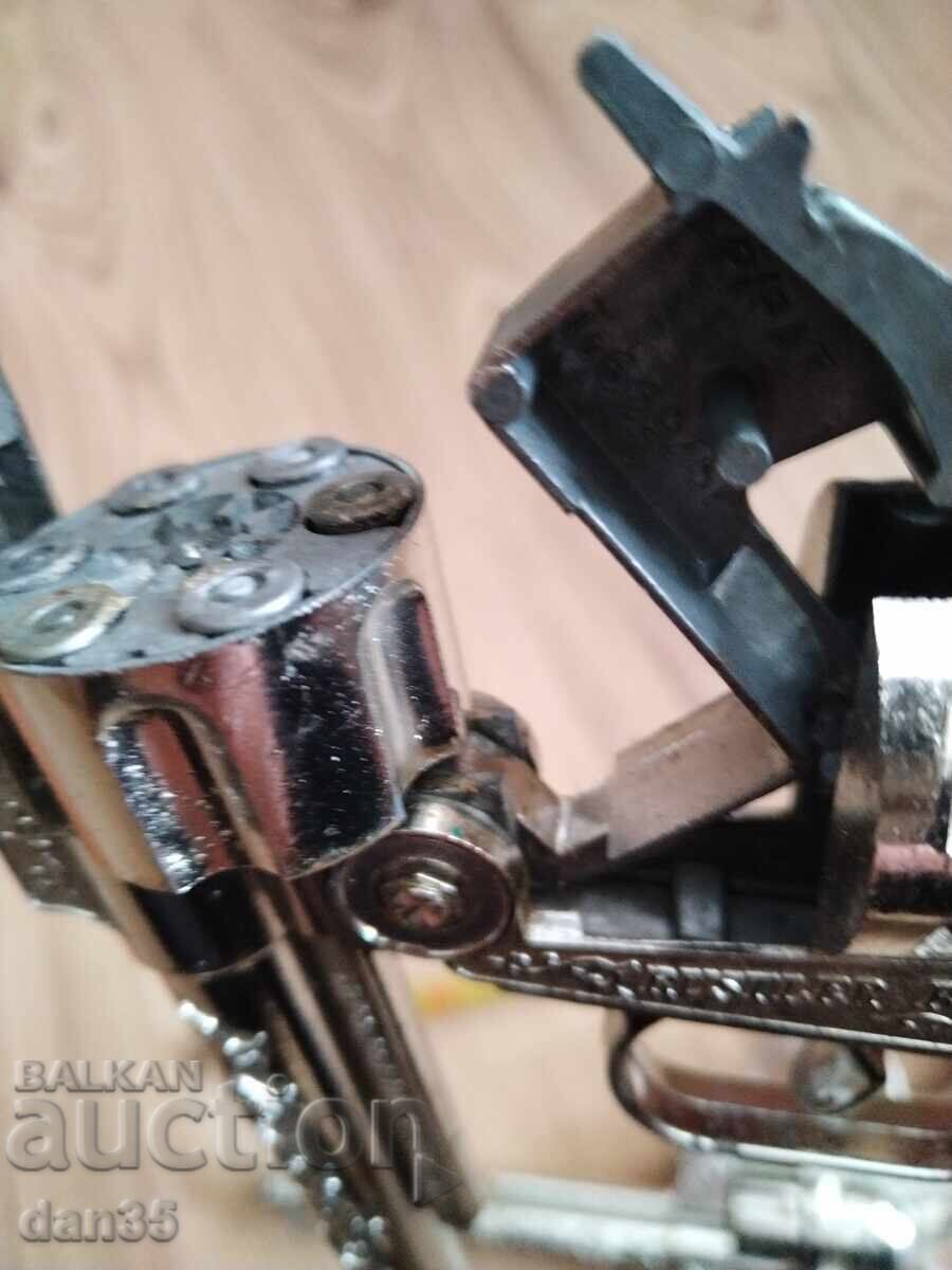 Delivery of TWO OLD CAPPED REVOLVERS