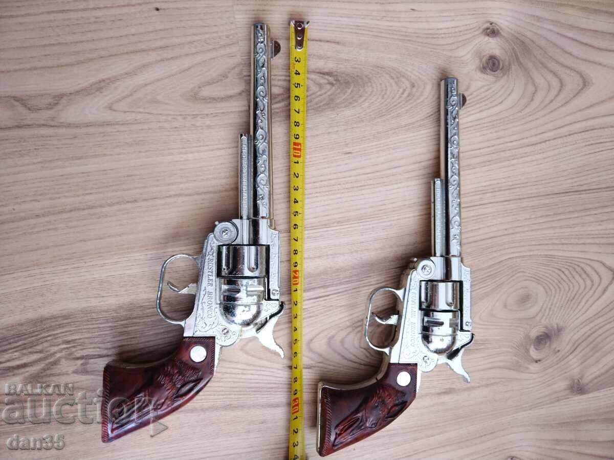 TWO OLD CAPPED REVOLVERS