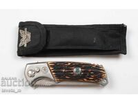 Automatic pocket knife with sheath and compass