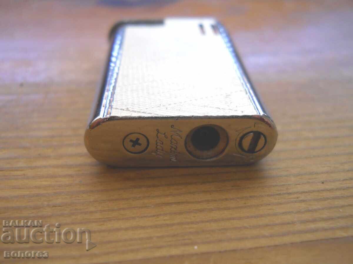 Auction "Maxim lady" Gas Lighter Auction "Maxim lady" Gas Lighter