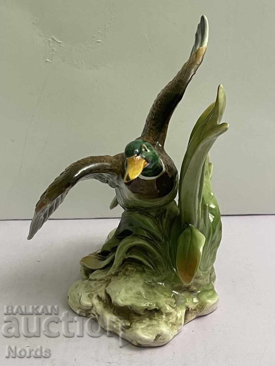 Delivery of Porcelain figurine with markings