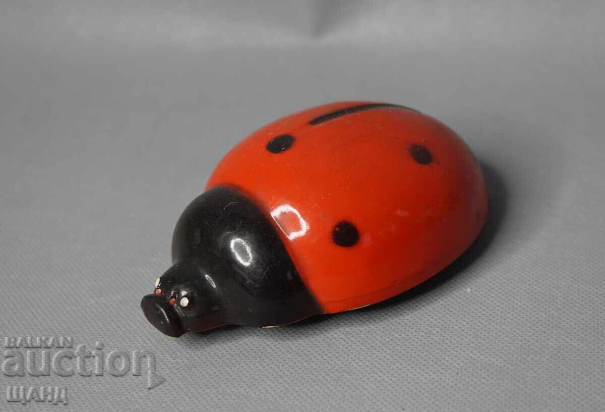 Old metal ladybug toy figure
