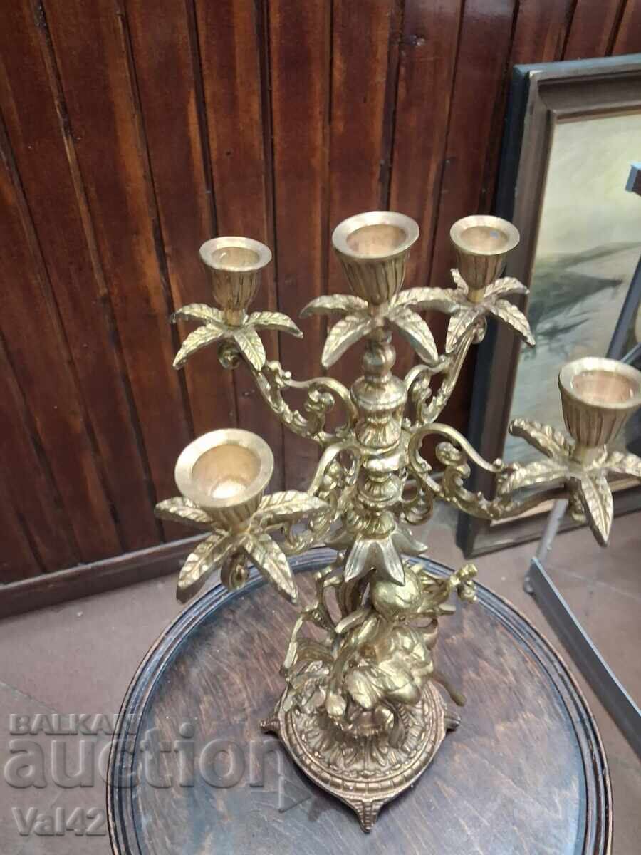 Delivery of Bronze candlestick "Five" with figural decoration