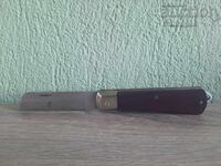 Folding knife with wooden handle