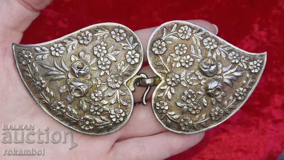 Auction  Rare Revival-era silver buckles with gilding