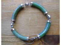 Old bracelet with links of green Chinese jade