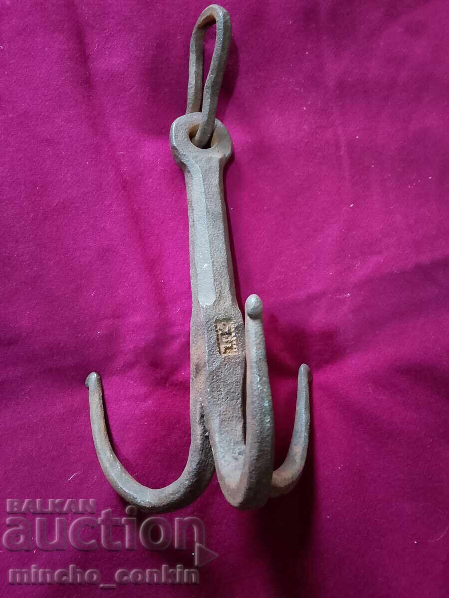 Hand-forged boat anchor with the master's mark
