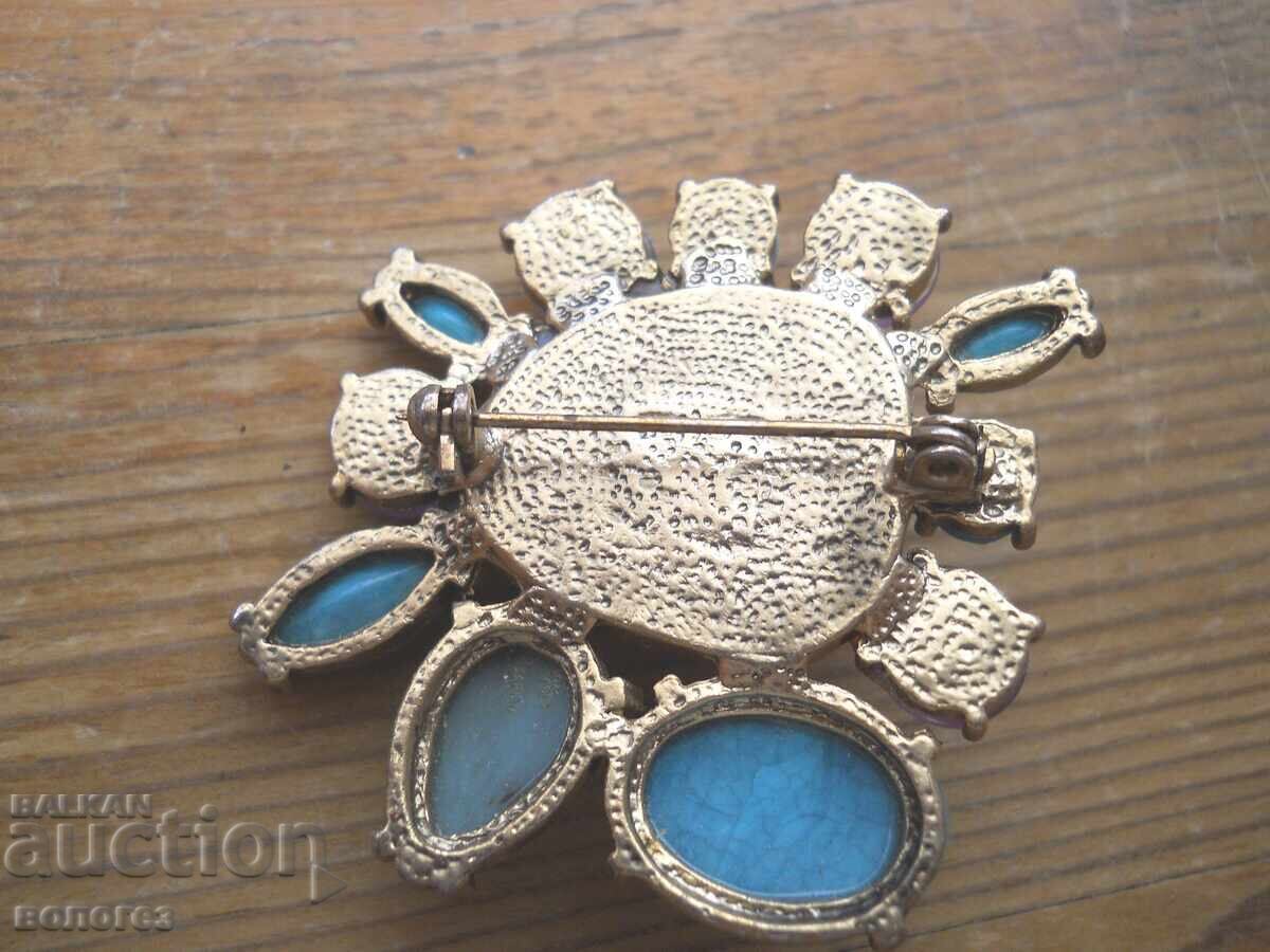 Brooch with semi-precious stones - turquoise and amethysts with price 60.00 BGN | € 30.68 Brooch with semi-precious stones - turquoise and amethysts with price 60.00 BGN | € 30.68