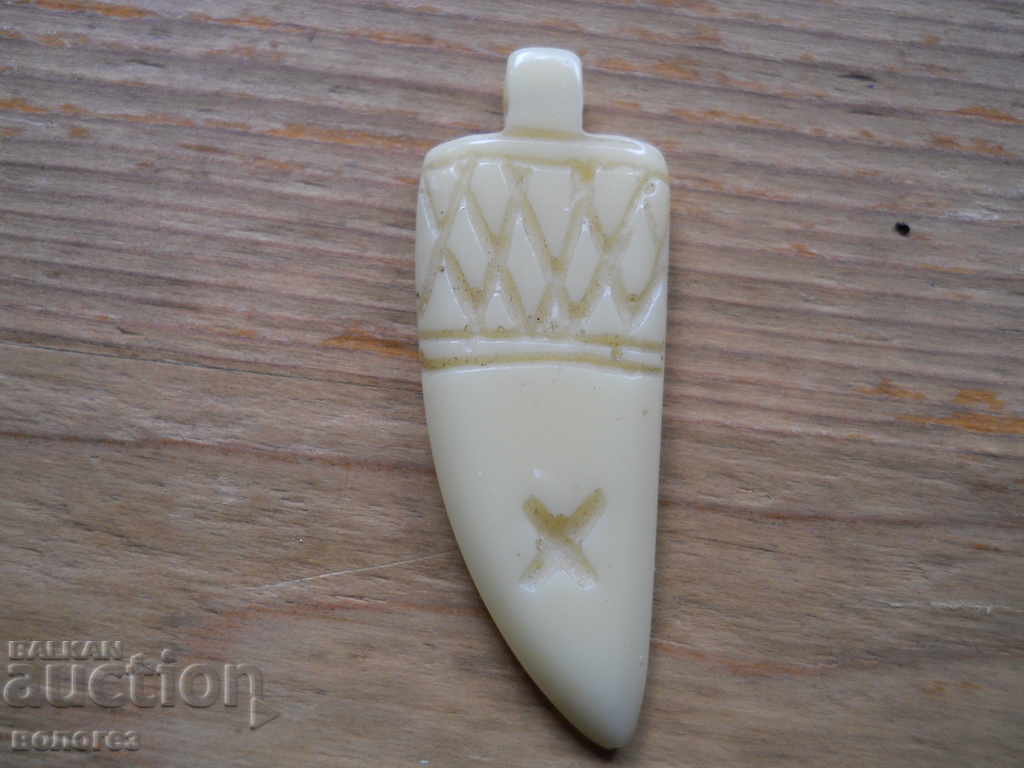 Μετάλλιο από ελεφαντόδοντο Μετάλλιο από ελεφαντόδοντο