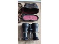 Vintage binoculars with a case for collectors