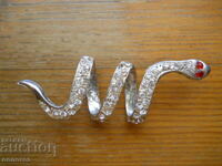 Silver-plated snake clip for securing a braid