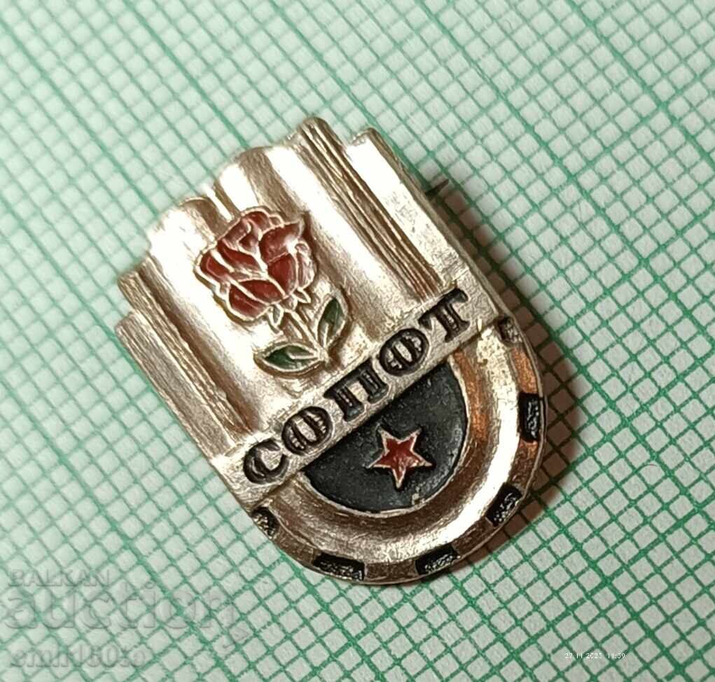 Παράδοση Σηματάκι - Σόποτ έμβλημα