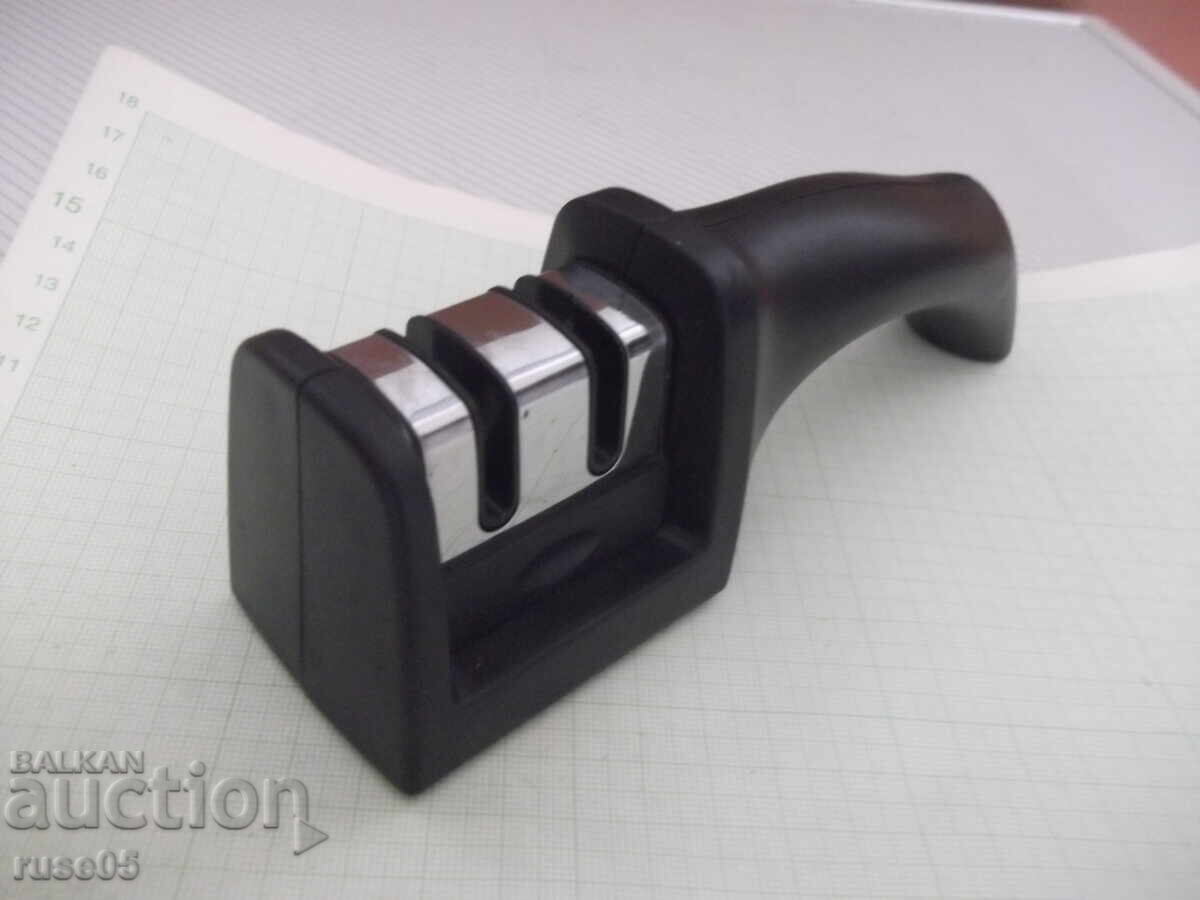 Auction  Knife sharpener and other items