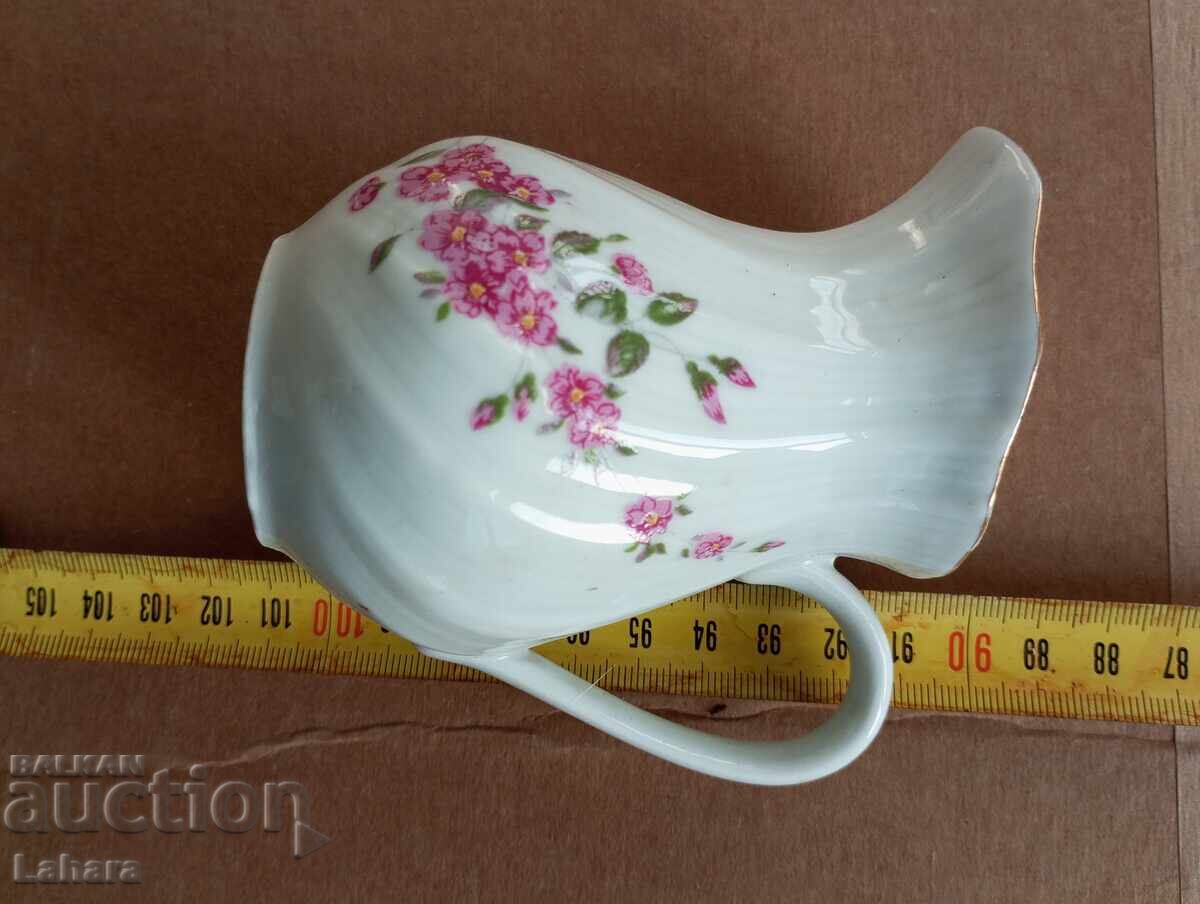 Livrarea ulcior de portelan