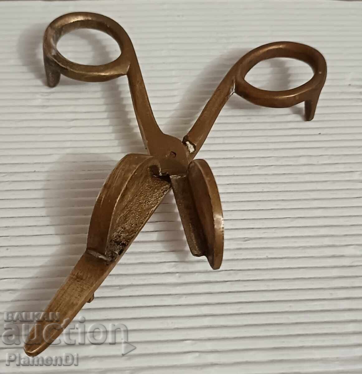 Brass candle snuffer Brass candle snuffer