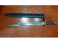 Shtik za M95 (in Cyrillic) translates to:

Σφιγκτήρας για M95