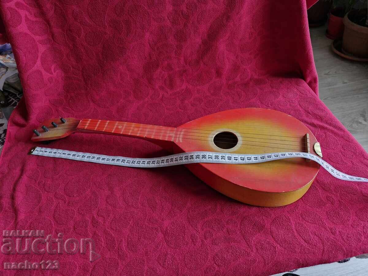Retro children's wooden guitar with price € 10.00 | 19.56 BGN Retro children's wooden guitar with price € 10.00 | 19.56 BGN