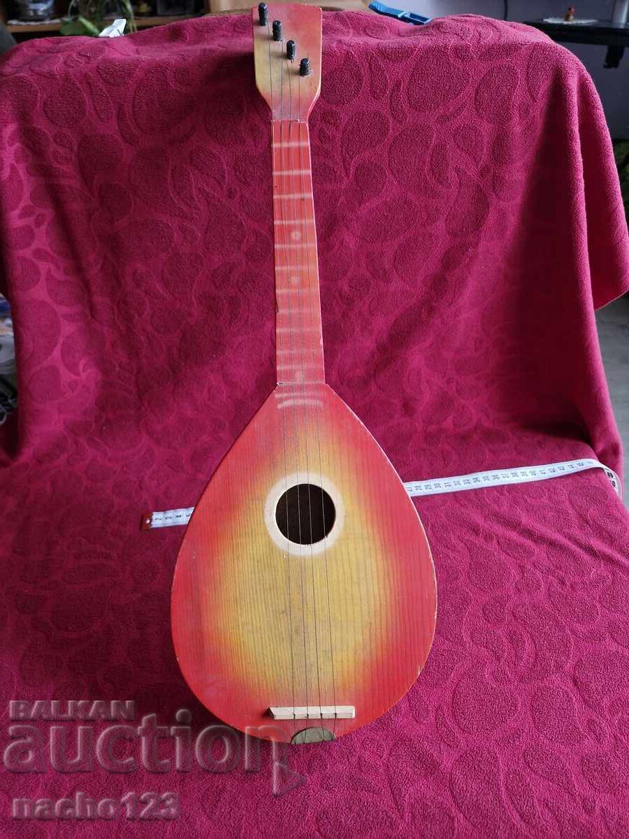 Retro children's wooden guitar Retro children's wooden guitar