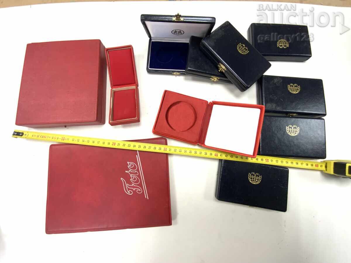 Lot of old boxes of plaques, medals, and orders