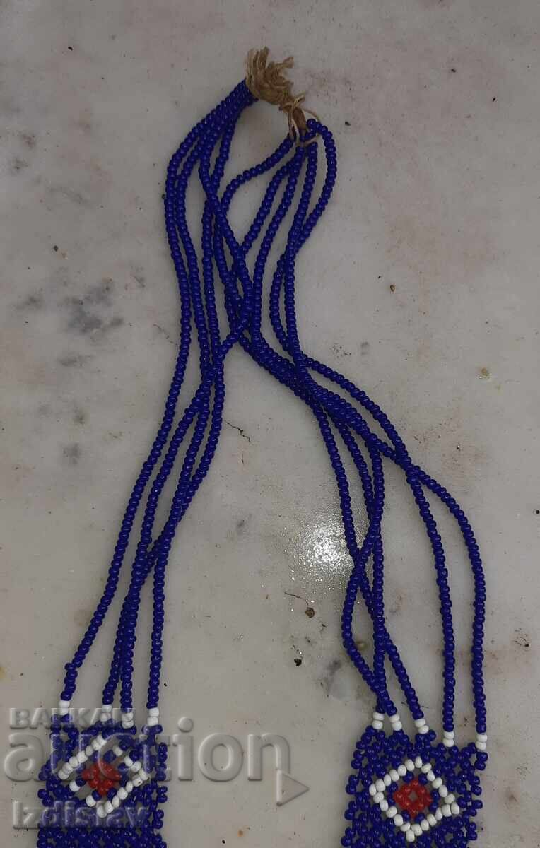 Auction Old beaded amulet Auction Old beaded amulet