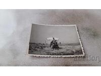 Φωτογραφία Άνδρες στην παραλία