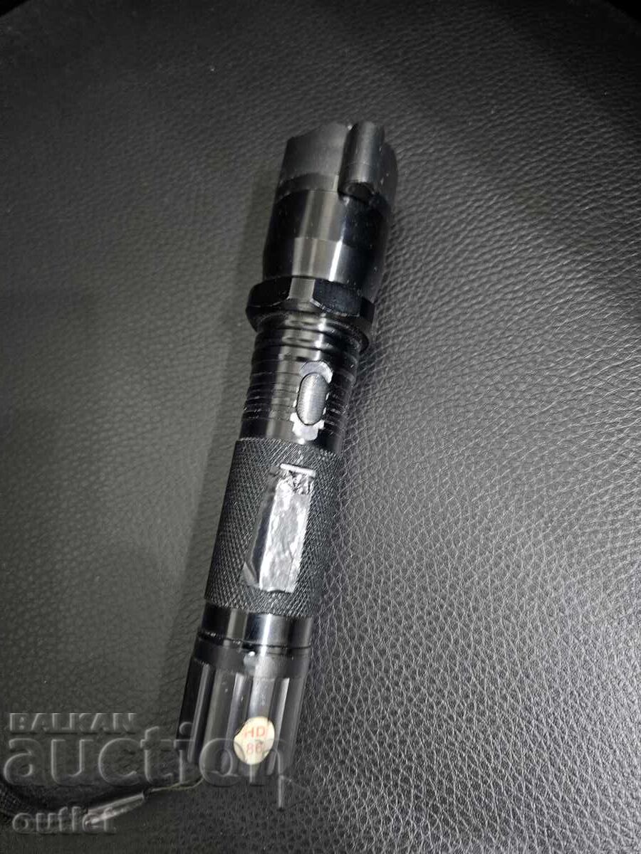 Flashlight with stun gun / II