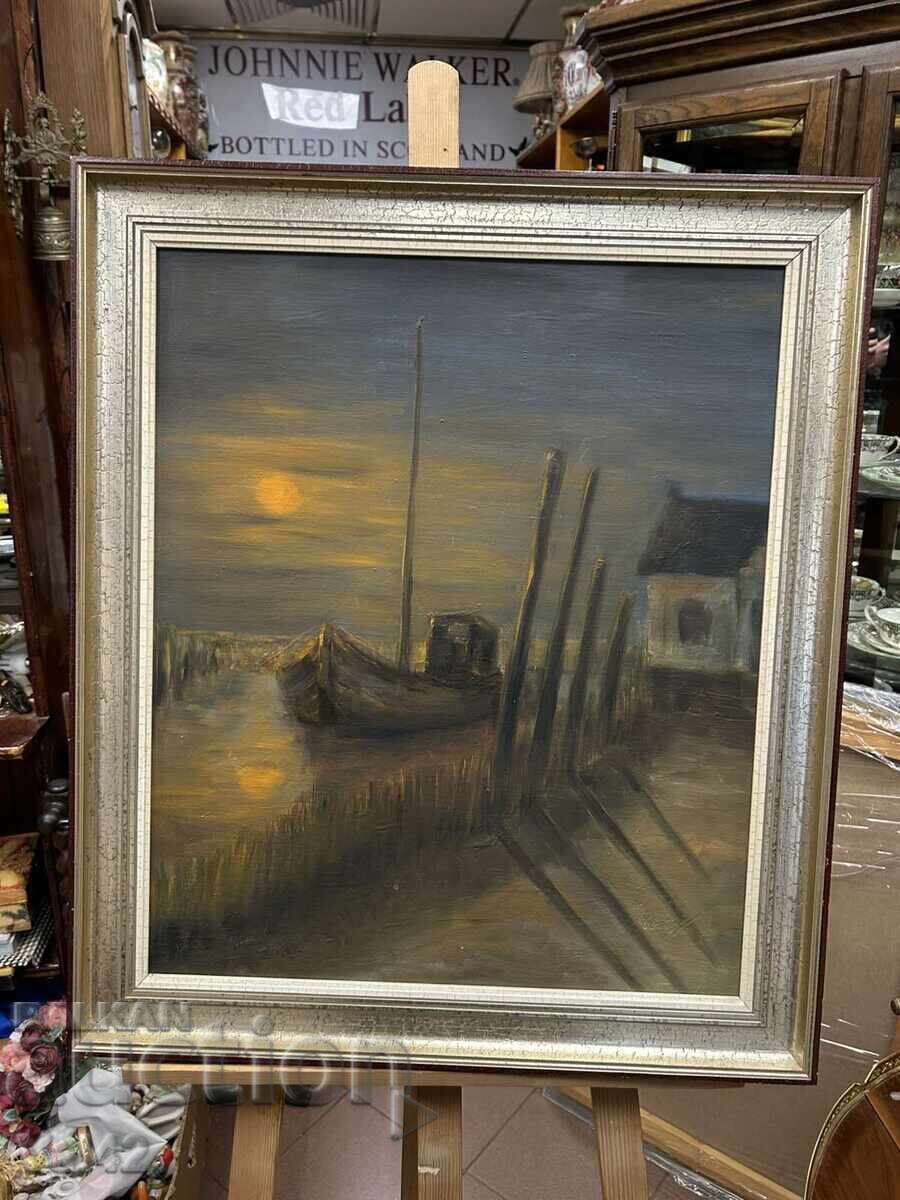 Ηλιοβασίλεμα στη θάλασσα με βάρκα