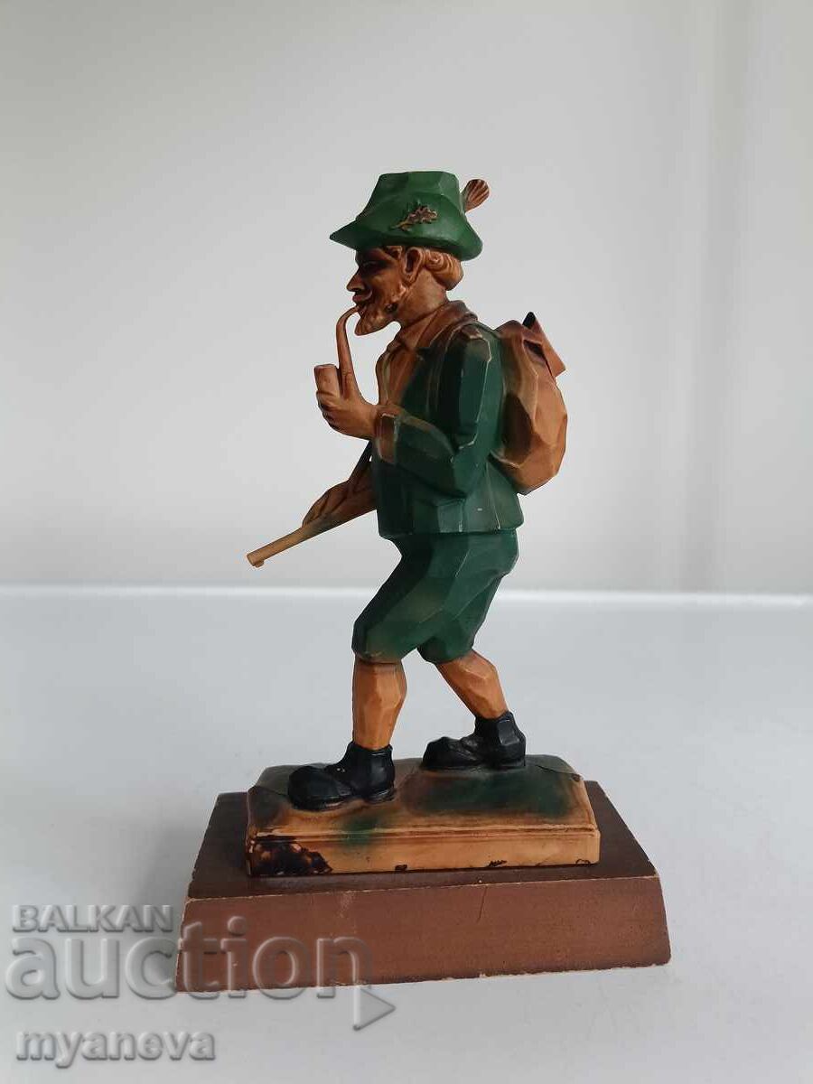 Delivery of German figurine of a hunter in traditional attire