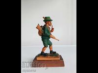 German figurine of a hunter in traditional attire