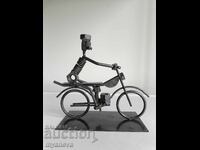 Motorist, artistic figure made of fasteners